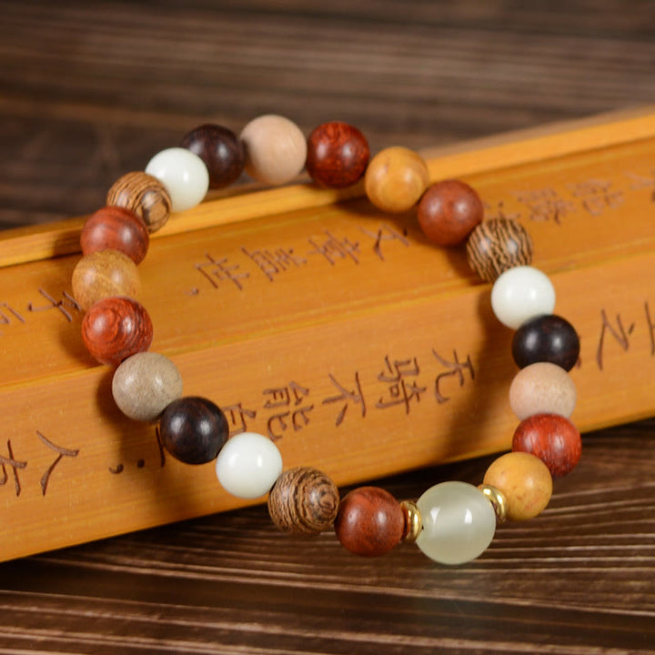Buddha Stones Multicolored Green Sandalwood Ebony Wood Red Sandalwood Peace Bracelet - Colorful Wood Beads 8mm*22 Beads& One Luminous Bead - image 1