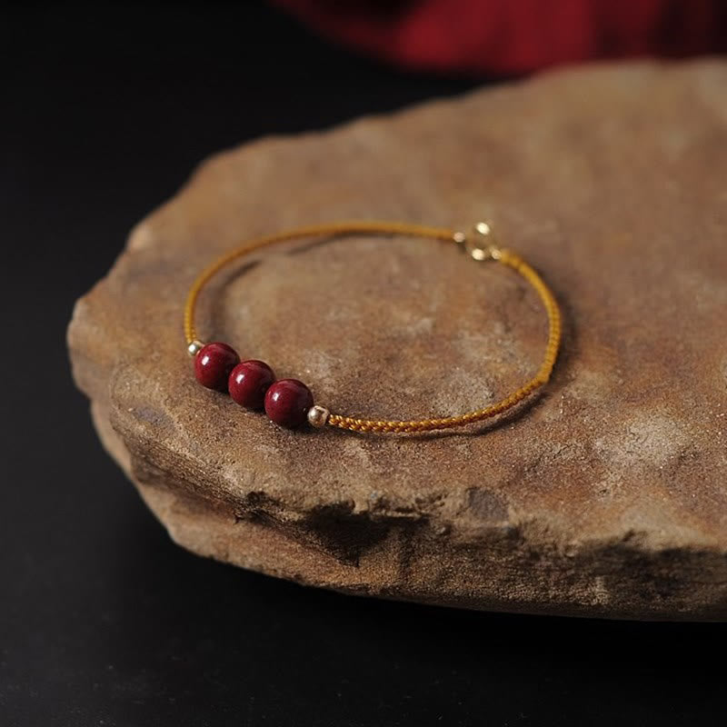 Buddha Stones 14K Gold Plated Natural Cinnabar Blessing String Braided Bracelet - Yellow(Wrist Circumference 14-15.5cm) - Three Cinnabar Beads - image 0