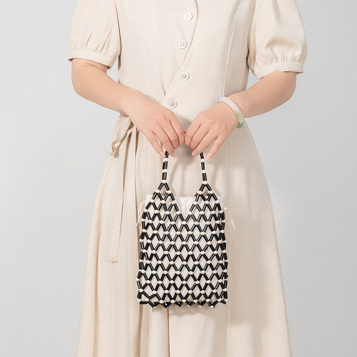 Buddha Stones Hand-woven Mesh Hollow Wooden Beads Handbag - image 1