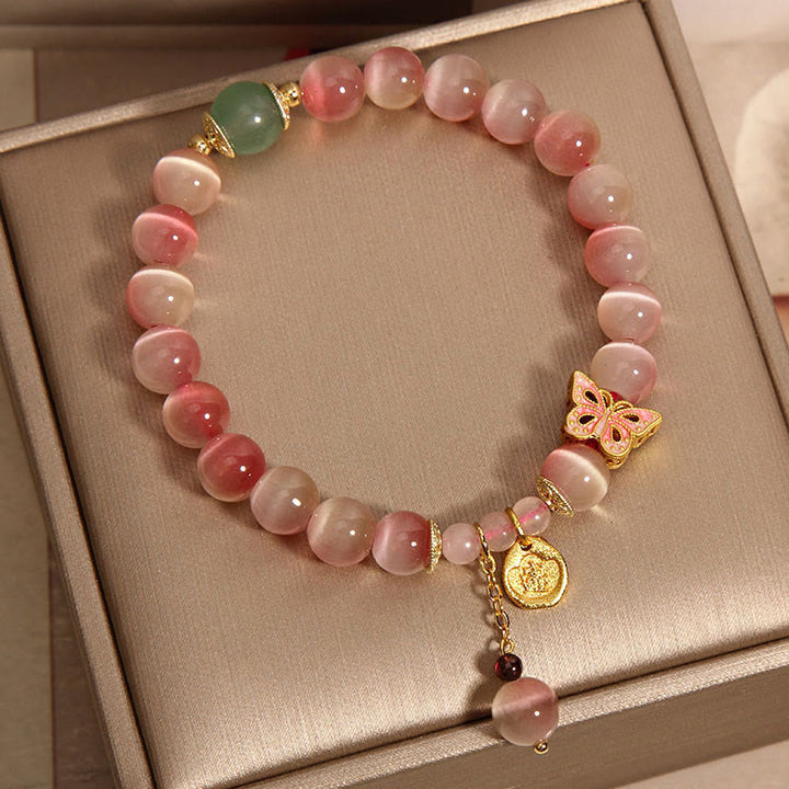 Buddha Stones Gradient Pink Cat's Eye Butterfly Peace Bracelet - image 1