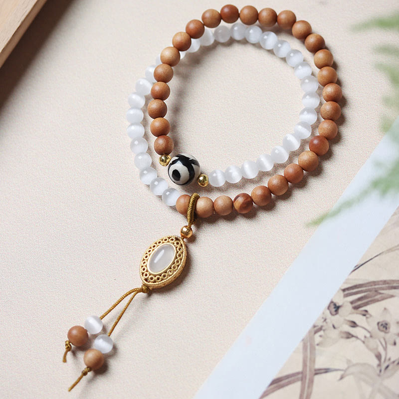 Buddha Stones Sandalwood Cat's Eye Three-eyed Dzi Bead Crystal Protectioin Bracelet - Sandalwood Cat's Eye(Wrist Circumference: 14-16cm) - image 0