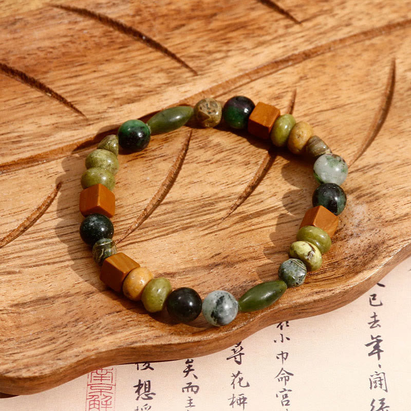 Buddha Stones Red Agate Shoushan Stone Calm Blessing Bracelet - Green Oval - image 0