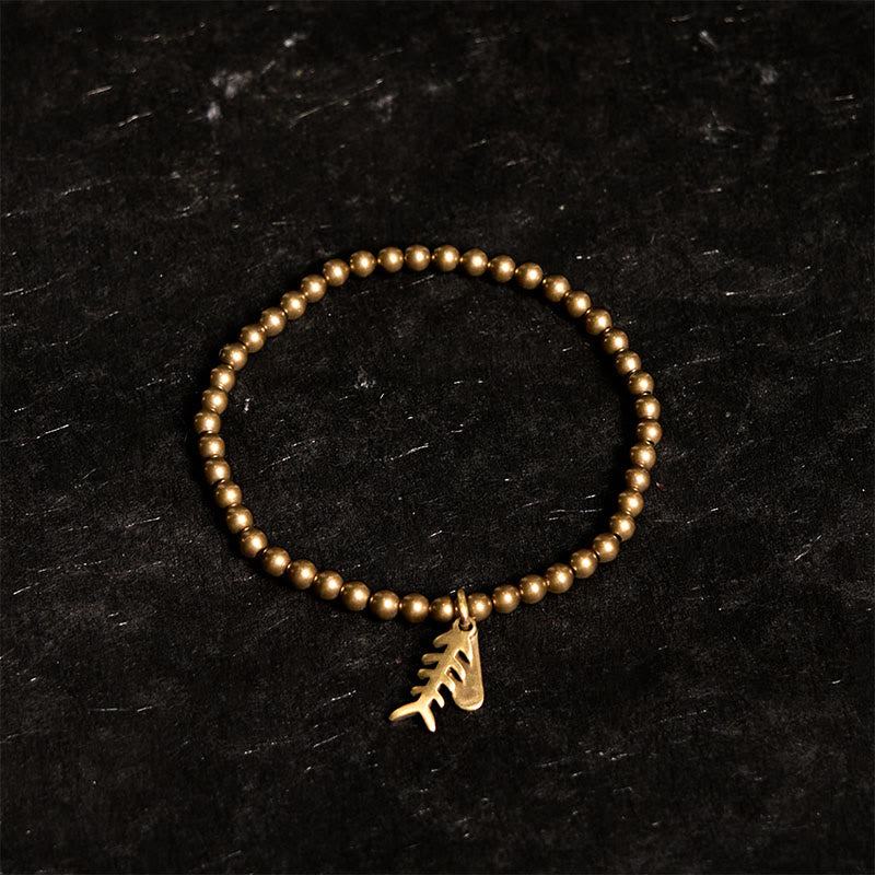 Buddha Stones Copper Fish Bone Healing Bracelet - image 1