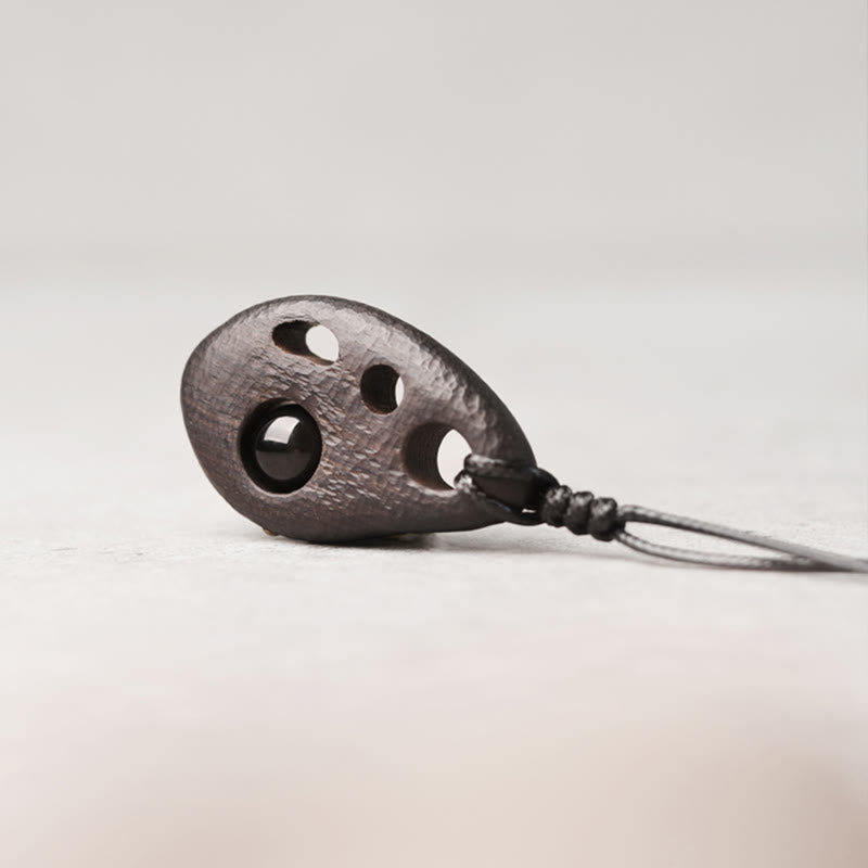 Buddha Stones Ebony Wood Hollow Inlaid Obsidian Peace Calm Necklace Pendant - image 1
