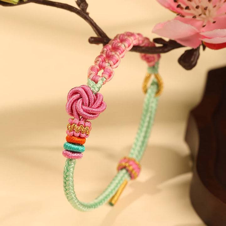 Buddha Stones Handmade Pink Green Peach Blossom Knot Braided Bracelet - image 1