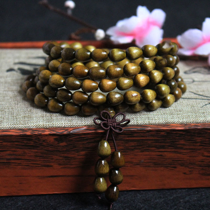 Buddha Stones 108 Mala Teardrop Beads Natural Phoebe Zhennan Wood Protection Bracelet - Phoebe Zhennan Wood(Wrist Circumference: 14-19cm) - image 0