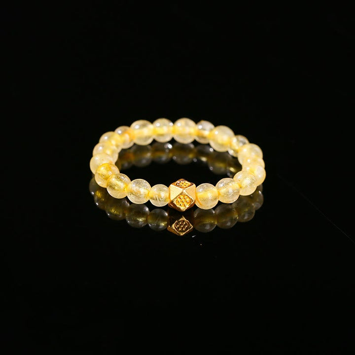 Buddha Stones 3mm Golden Rutilated Quartz Beads Wealth Elastic String Ring - image 1