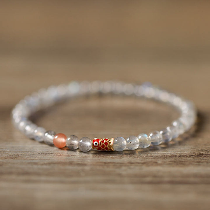 Buddha Stones Ultra-Thin Moonstone Koi Fish Healing Bracelet - image 1