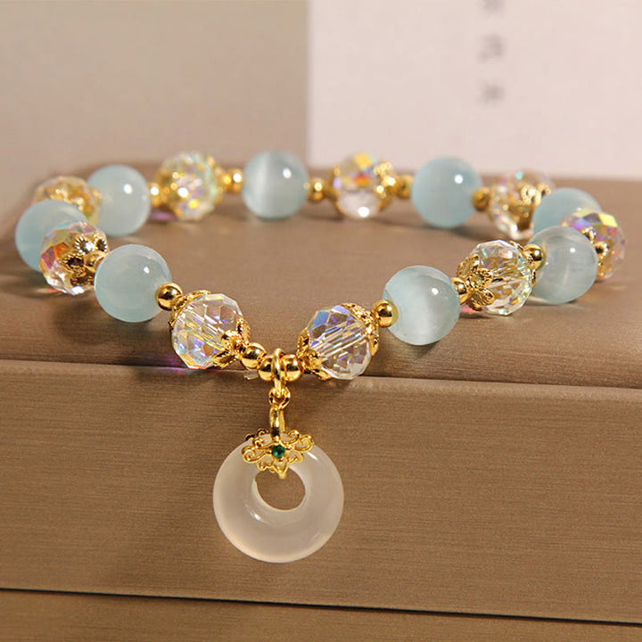 Buddha Stones Blue Cat's Eye White Crystal Peace Buckle Meaning Balance Bracelet - image 1