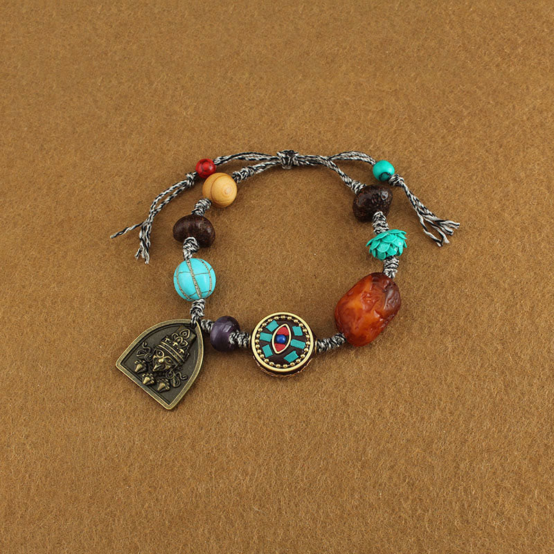 Buddha Stones Tibetan Buddha's Eye Turquoise Lotus Zakiram Protection Rope Bracelet - image 1