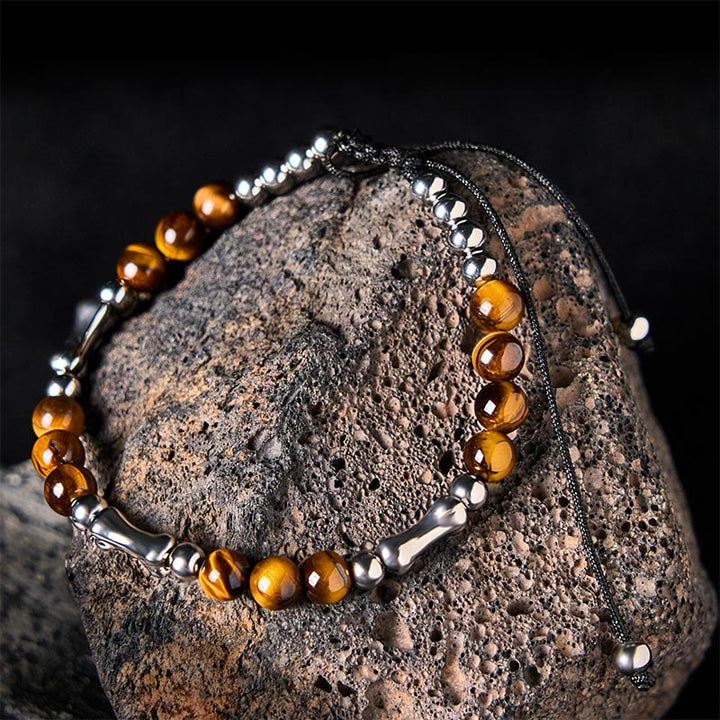 Buddha Stones Cute Bone Pattern Tiger Eye Courage Beads Bracelet - Tiger Eye & Titanium Steel(Wrist Circumference: 15-21cm) - image 0