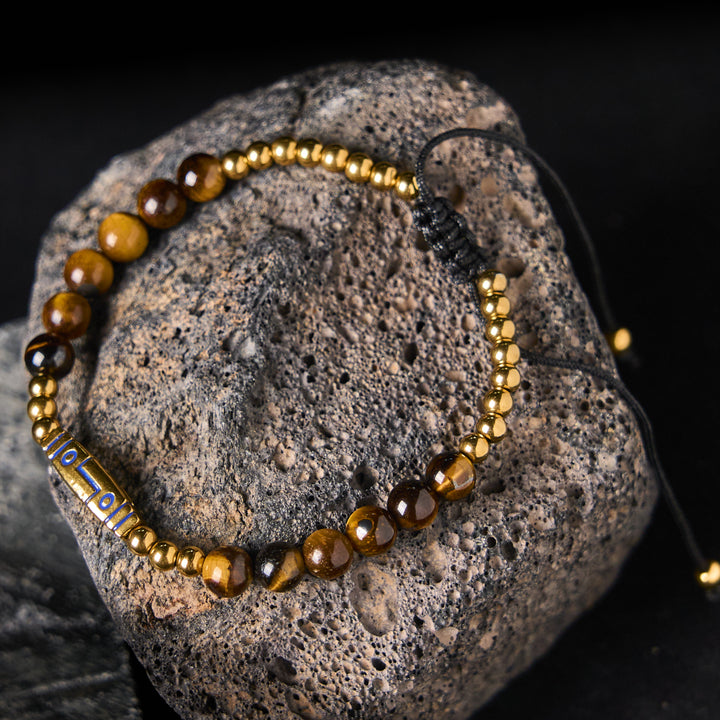 Buddha Stones Cute Bone Pattern Tiger Eye Courage Beads Bracelet - Yellow Tiger Eye & Titanium Steel(Wrist Circumference: 15-21cm) - image 0