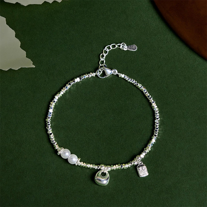 Buddha Stones Copper Plated Silver Fu Character Purse Pearl Blessing Bracelet - Copper Purse(Wrist Circumference: 15-17cm) - image 0