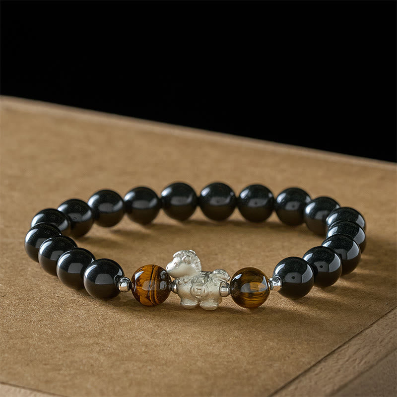 Buddha Stones Year Of The Horse 999 Sterling Silver Horse Charm Black Obsidian Tiger Eye Strength Bracelet - image 1