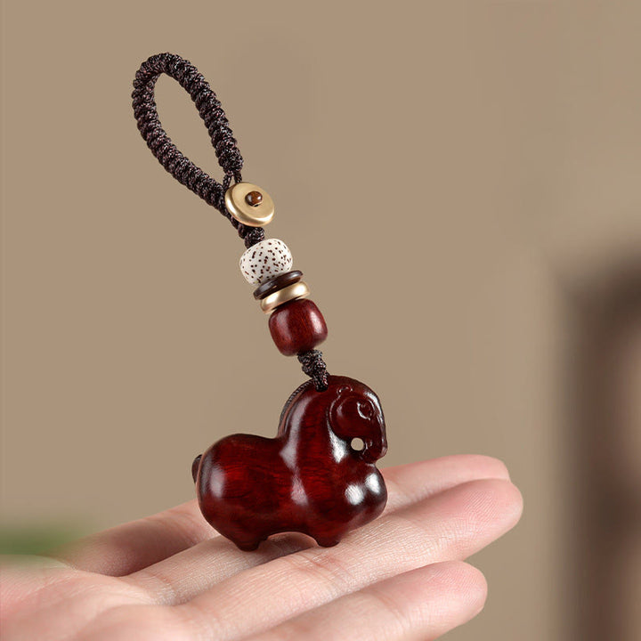 Buddha Stones Year Of The Horse Small Leaf Red Sandalwood Balance Key Chain - image 1