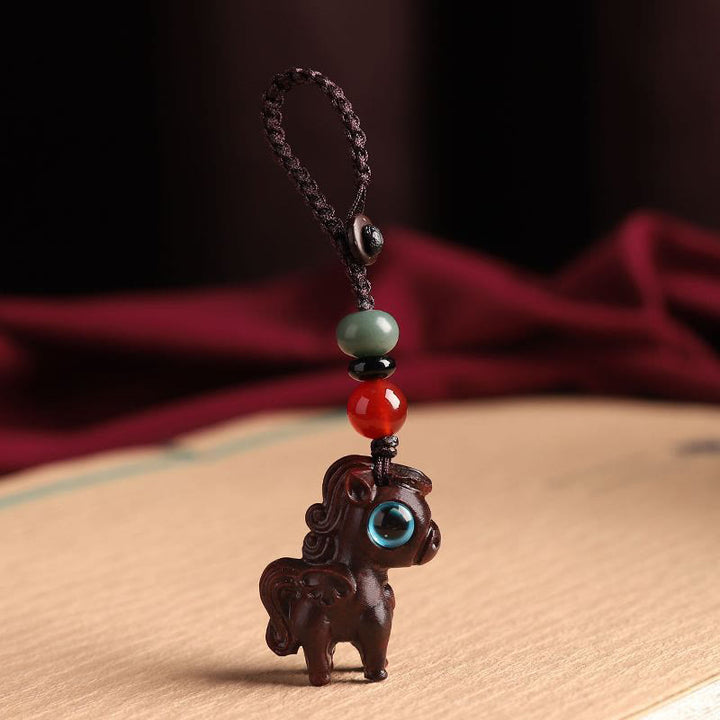 Buddha Stones Year Of The Horse Small Leaf Red Sandalwood Green Sandalwood Relaxation Key Chain - Small Leaf Red Sandalwood Key Chain - image 0