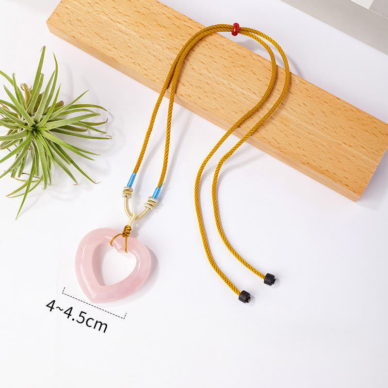 Buddha Stones Natural Rose Quartz Hollow Love Heart Caring Necklace Pendant - Natural Rose Quartz(Color Shape and Size May vary) - image 1