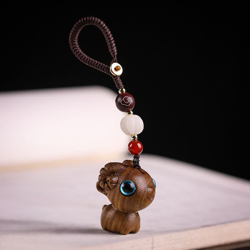 Buddha Stones Green Sandalwood Sheep Luck Hand Carved Keychains - image 1