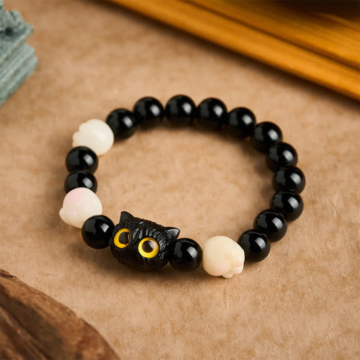 Buddha Stones Hand Carved Black Obsidian Yellow Eye Cat Head Grounding Bead Bracelet - Black Obsidian (Purification ♥ Strength) (Wrist Circumference: 16–17 cm) - image 0