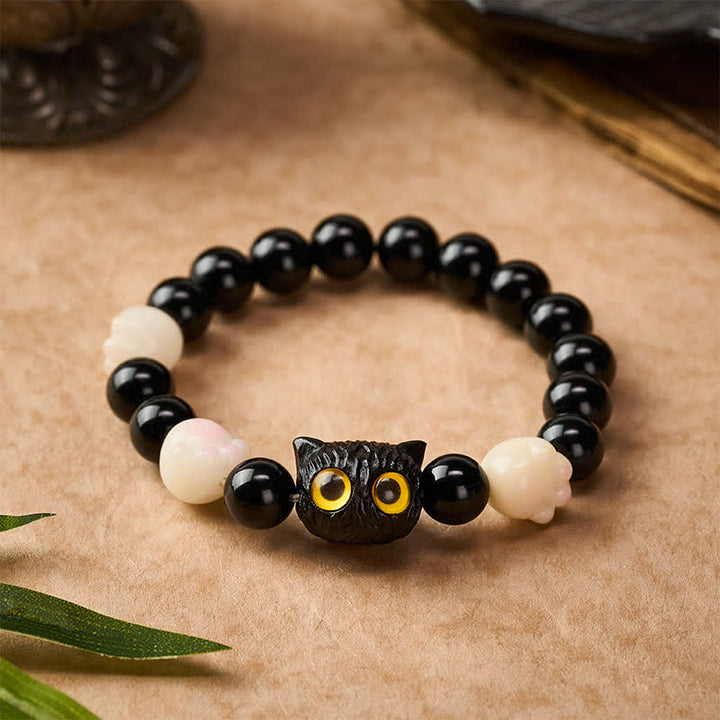 Buddha Stones Hand Carved Black Obsidian Yellow Eye Cat Head Grounding Bead Bracelet - image 1