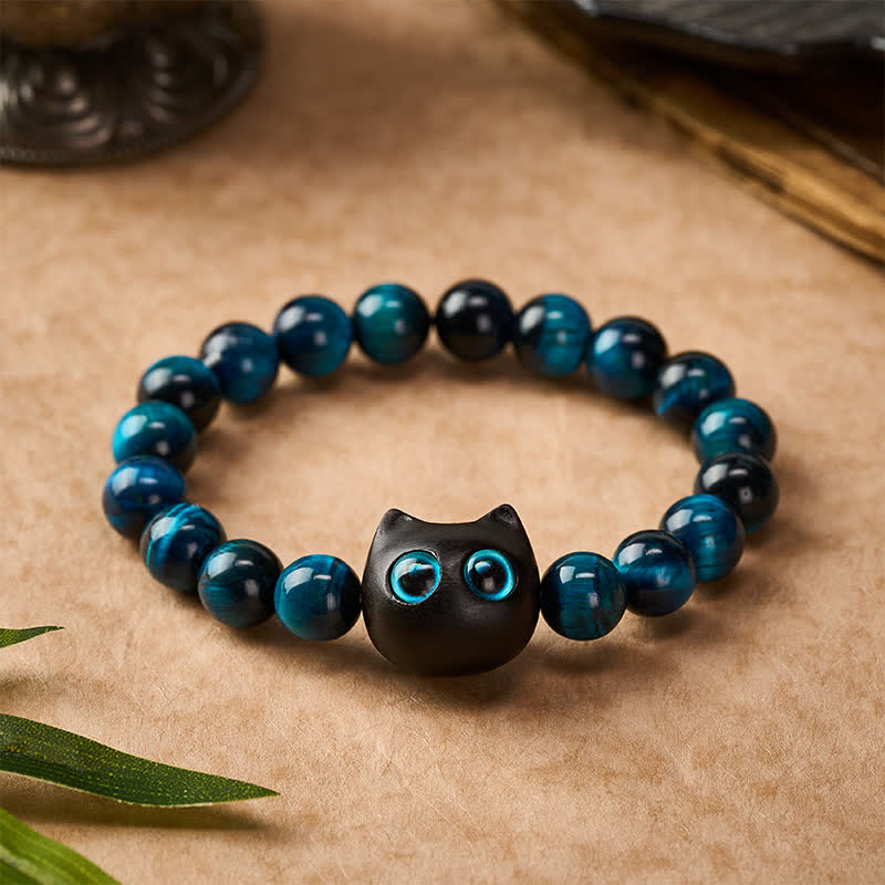 Buddha Stones Blue Tiger Eye Ebony Wood Cat Strength Bracelet - image 1