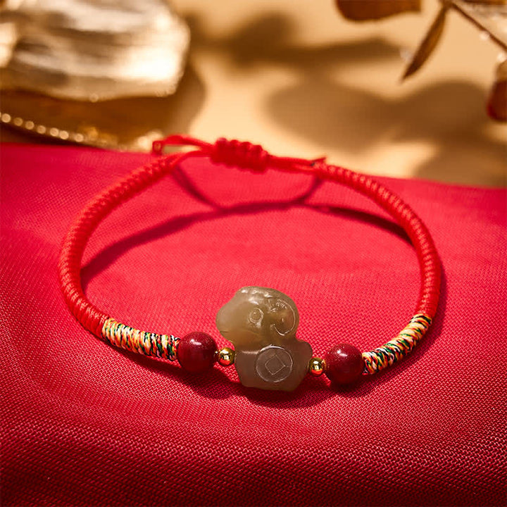 Buddha Stones Year of the Goat Hetian Jade Goat Charm Cinnabar Protection Braided String Bracelet - image 1