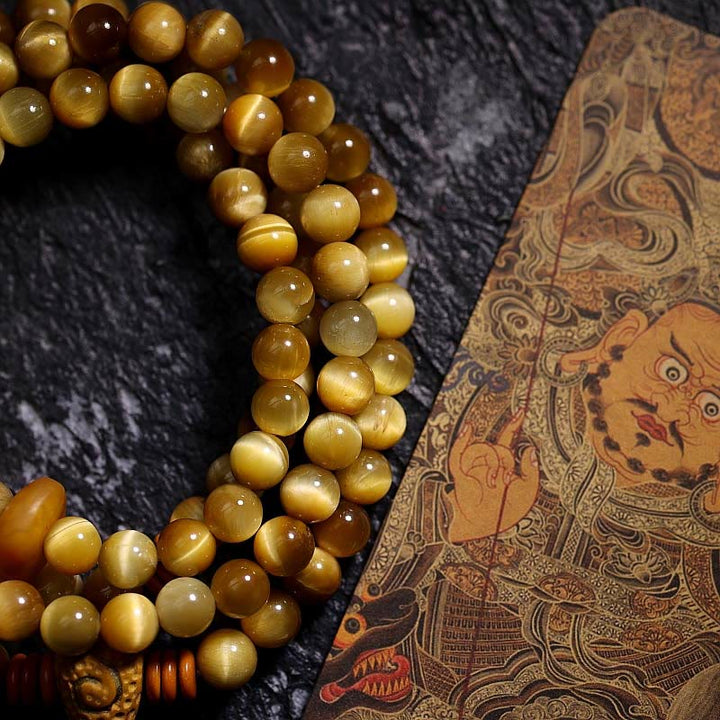 Buddha Stones 108 Mala Beads Natural Tiger Eye Copper Dorje Protection Tassel Bracelet - image 1