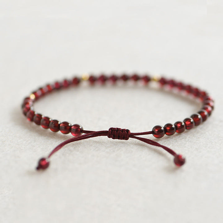 Buddha Stones Natural Garnet Golden Beads Stability Bracelet - image 1