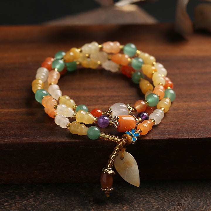 Buddha Stones Golden Silk Jade Gourd Wealth Bracelet - image 1