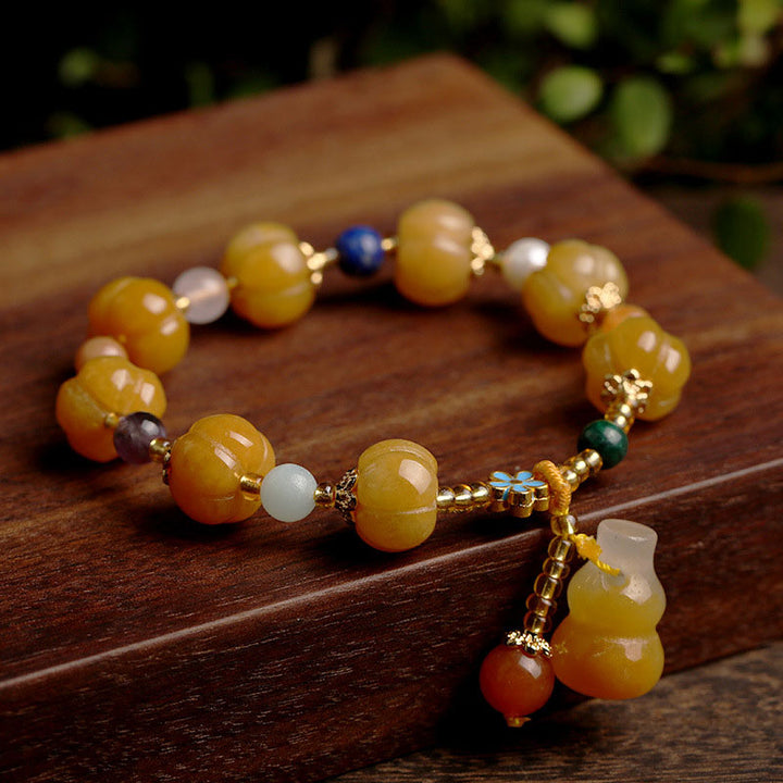 Buddha Stones Golden Silk Jade Pixiu Wealth Bracelet - image 0
