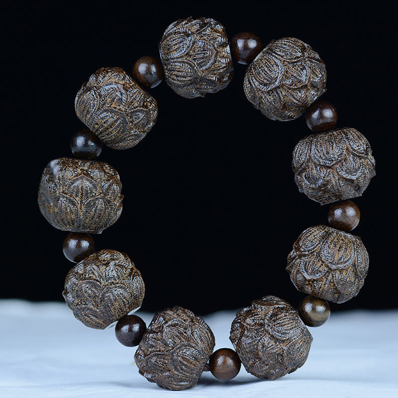 Buddha Stones Ebony Wood Eighteen Arhats Lotus Dragon Engraved Balance Bracelet - 20mm*9 Beads(Lotus) - image 1
