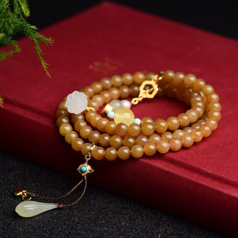 Buddha Stones Natural Hetian Topaz Amber Lotus White Jade Pearl Success Bracelet - image 1