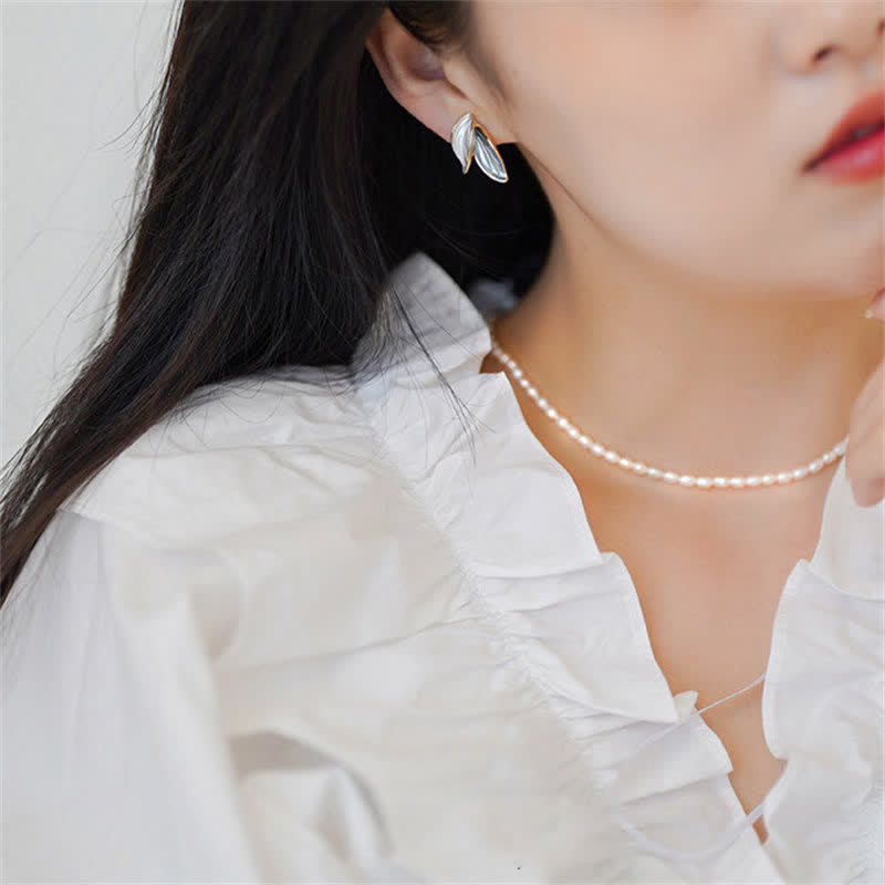 Leaf Design Luck Stud Earrings - image 1