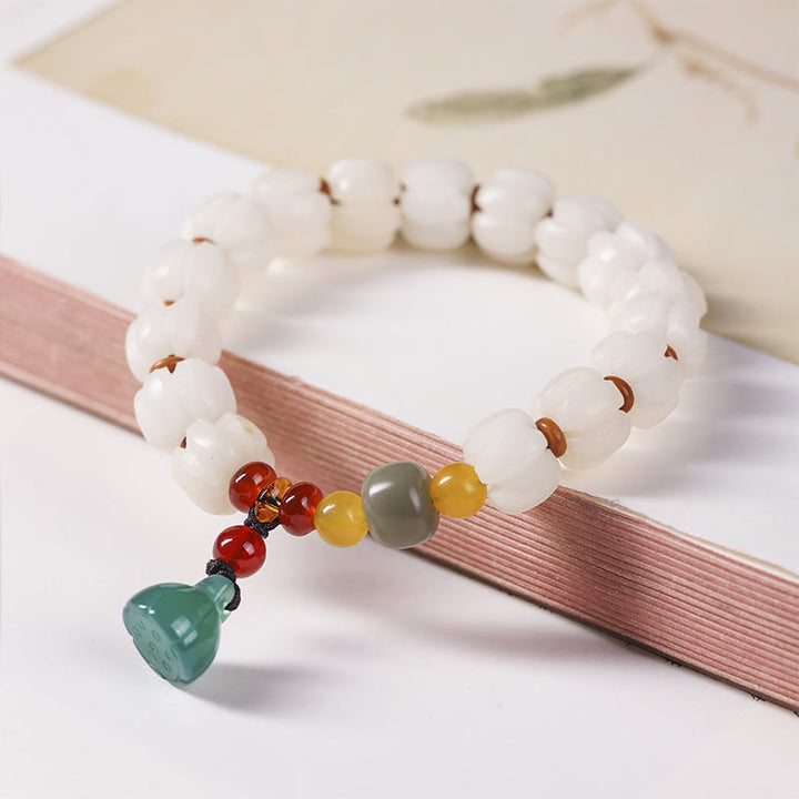 Buddha Stones Natural Bodhi Seed Red Agate Bodhi Calm Harmony Engraved Pumpkin Bead Lotus Bracelet - image 1