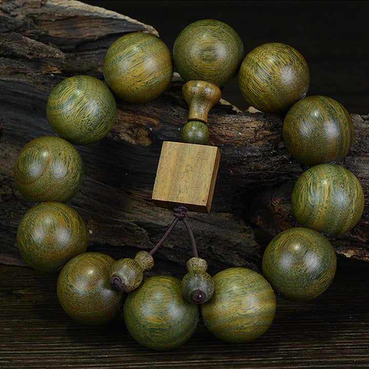 Buddha Stones Tibetan Green Sandalwood Cure Bracelet - 20mm(12 beads) - image 0