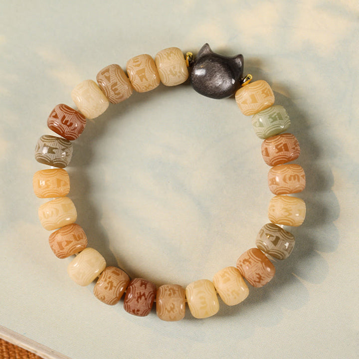 Buddha Stones Bodhi Seed Silver Sheen Obsidian Cat Head Om Mani Padme Hum Engraved Harmony Bracelet - image 1